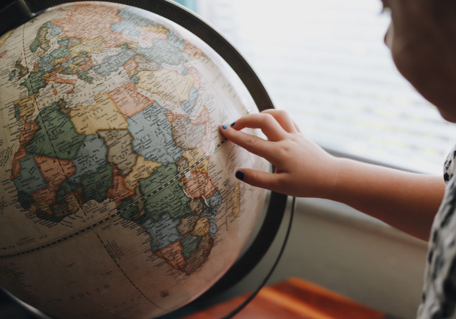 beige and blue desk globe